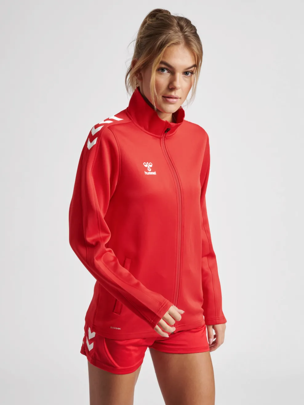 hmlCORE XK POLY ZIP SWEAT WOMAN