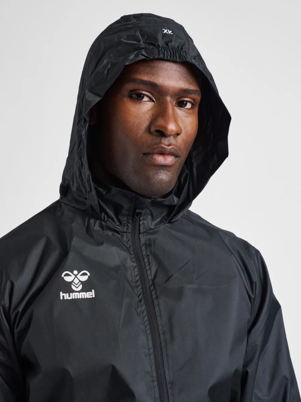 hmlCORE XK SPRAY JACKET