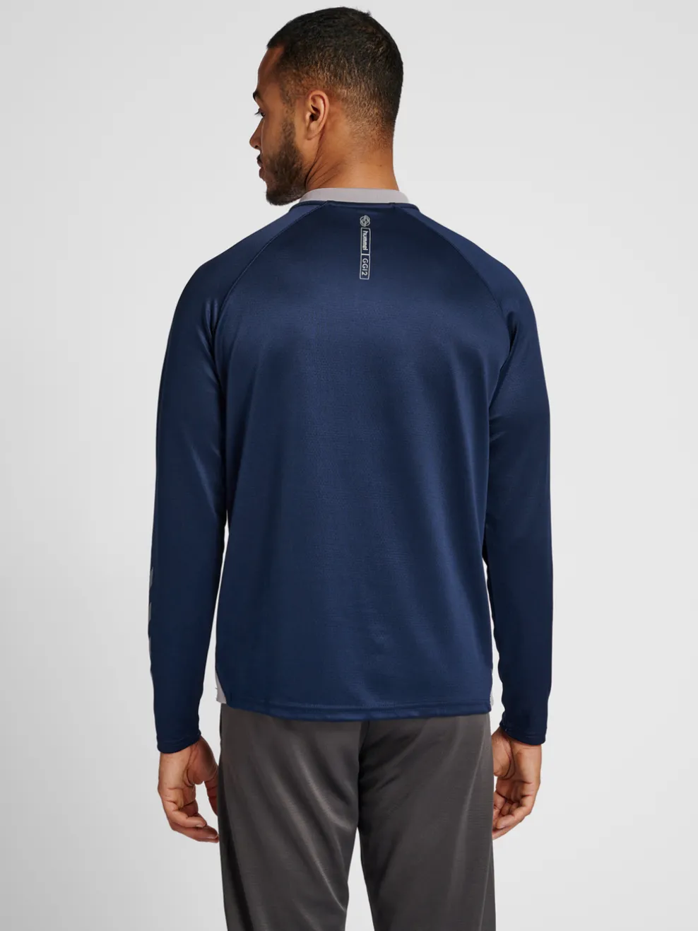 hmlGG12 ACTION HALF ZIP SWEAT