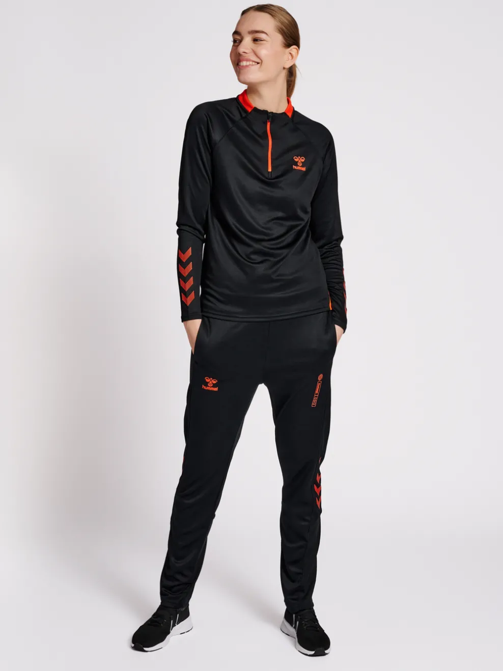 hmlGG12 ACTION HALF ZIP SWEAT WOMAN