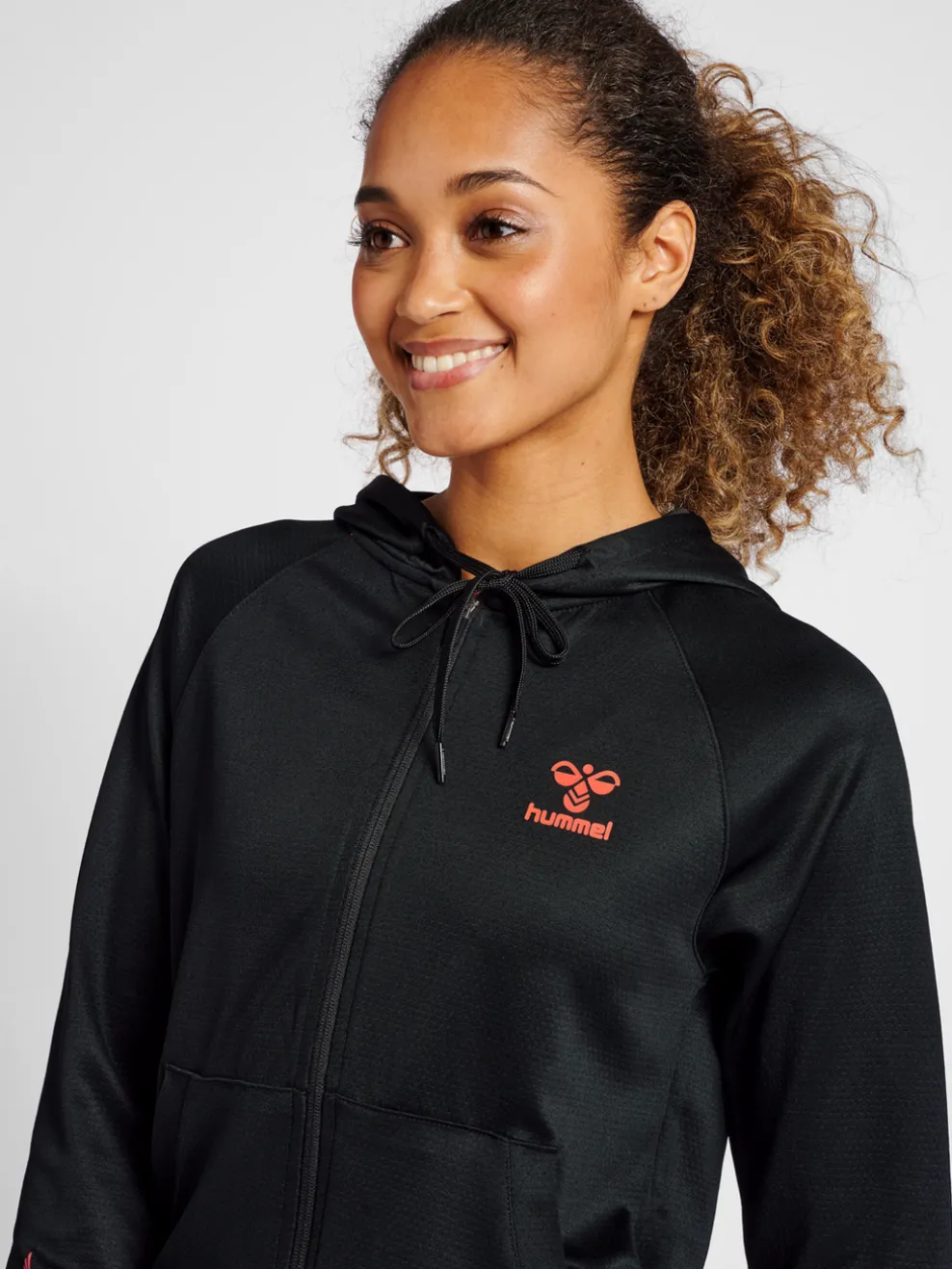 hmlGG12 ACTION ZIP HOODIE WOMAN