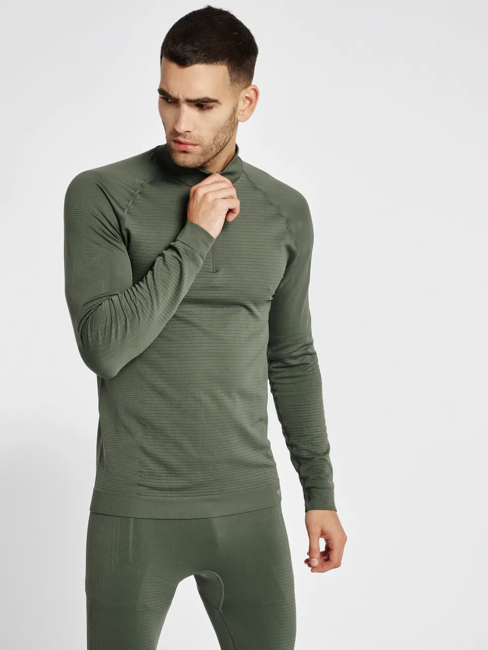hmlSTROKE SEAMLESS HALF ZIP