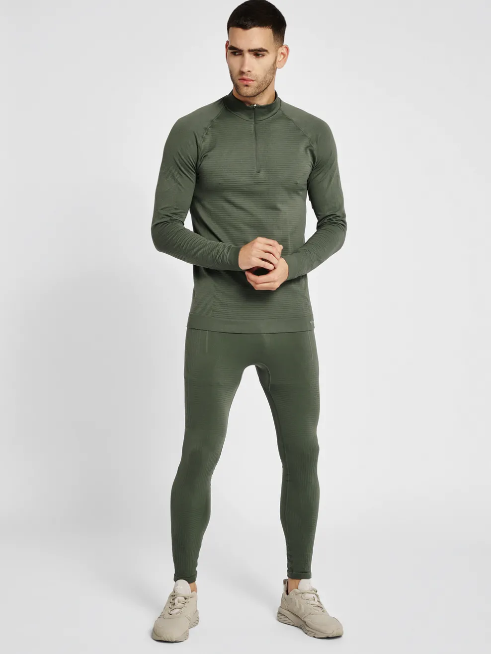 hmlSTROKE SEAMLESS HALF ZIP